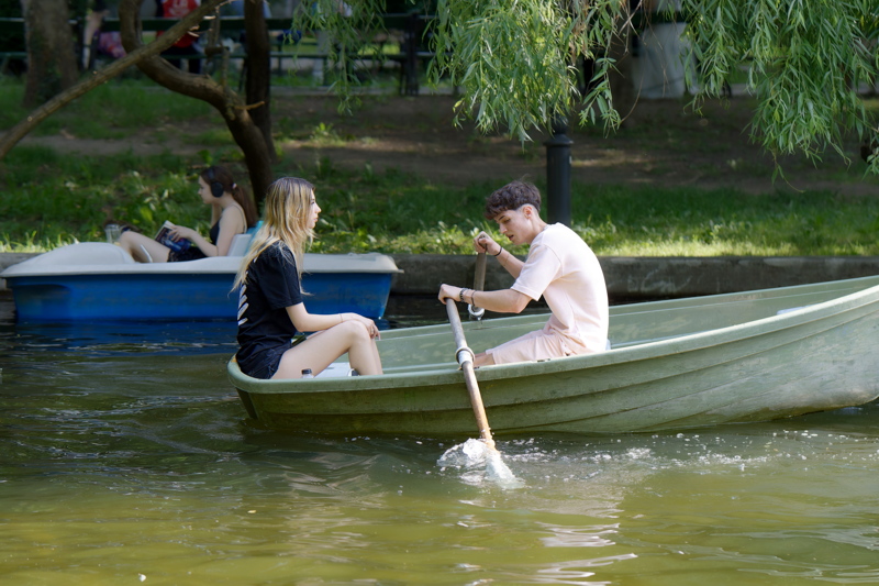 27 - People enjoying a boat ride in Cismigiu Gardens, a historic park in the center of Bucharest